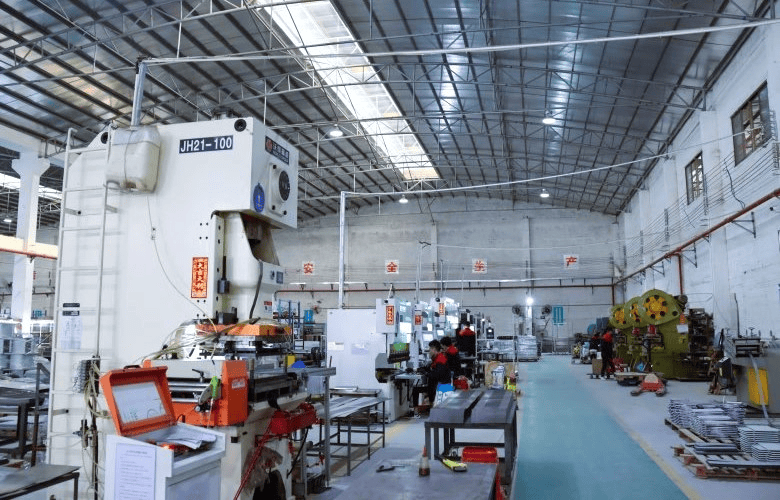 JH21-100 industrial electric motor manufacturing workshop at ECvents EC Motor Shop, showcasing advanced machinery and assembly stations for high-quality electric motor production.